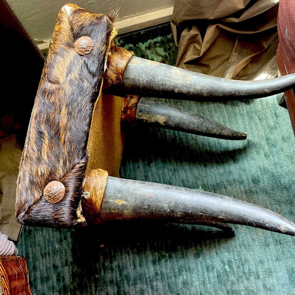 Cow hide foot stool. Handmade. No flaws practically brand new.